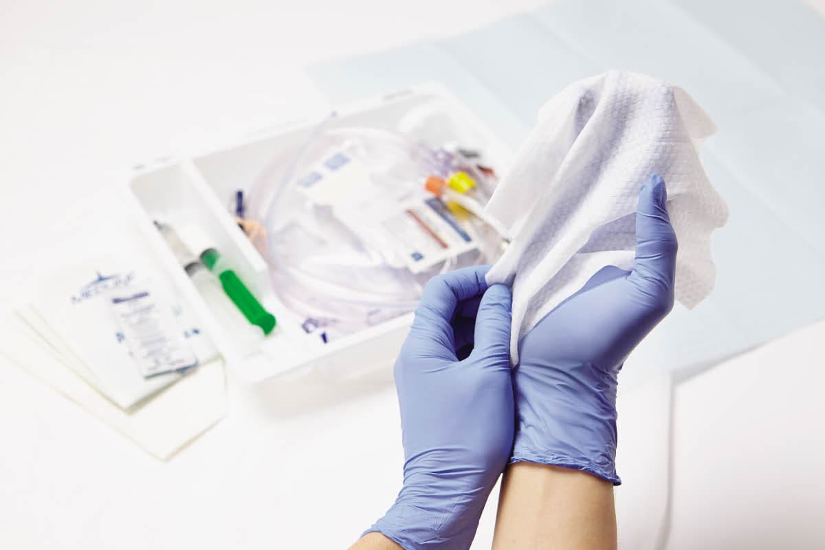 Clinician demonstrating urinary catheter best practices